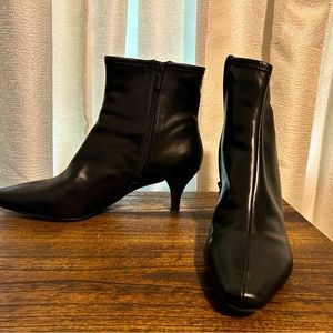 Black low heel boot.
